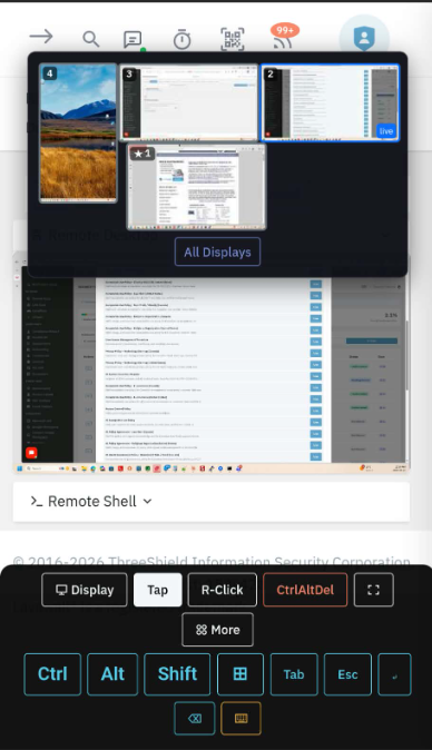 A Lavawall remote-support session driven from a phone browser: a display picker showing every monitor on the remote computer with an All Displays option, a Remote Shell control, and an on-screen keyboard bar with Ctrl, Alt, Shift, Tab, Esc and a one-tap Ctrl+Alt+Delete