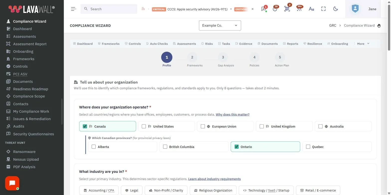 The Compliance Wizard page in the Lavawall console, showing the step indicator, tell us about your organization, your applicable frameworks and gap analysis, with example data.